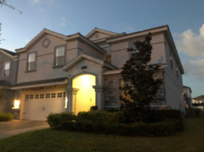 8 bedrooms, 5 bathrooms. Theater Room + Pool/Spa + WiFi